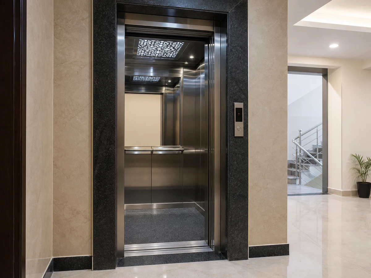 Passenger lift with stainless steel doors in a modern apartment society lobby